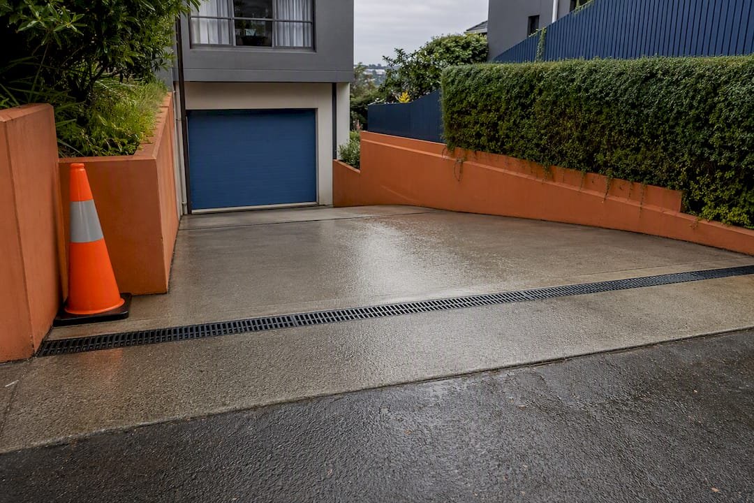 Safe sloping driveway with channel drainage